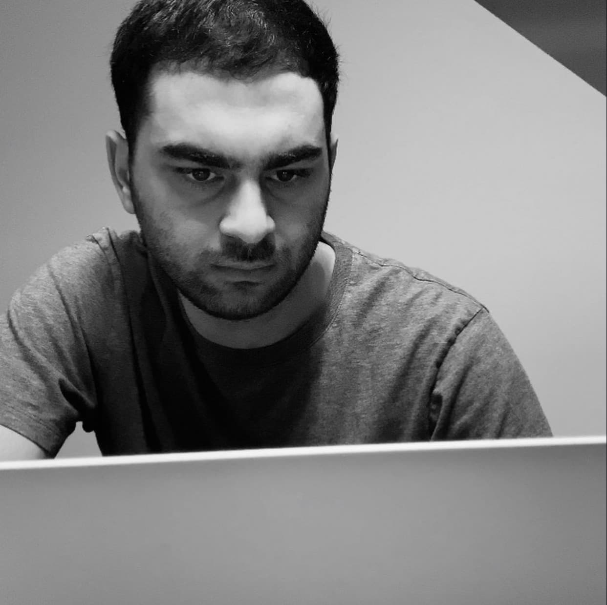 Aphid team member focused at a laptop